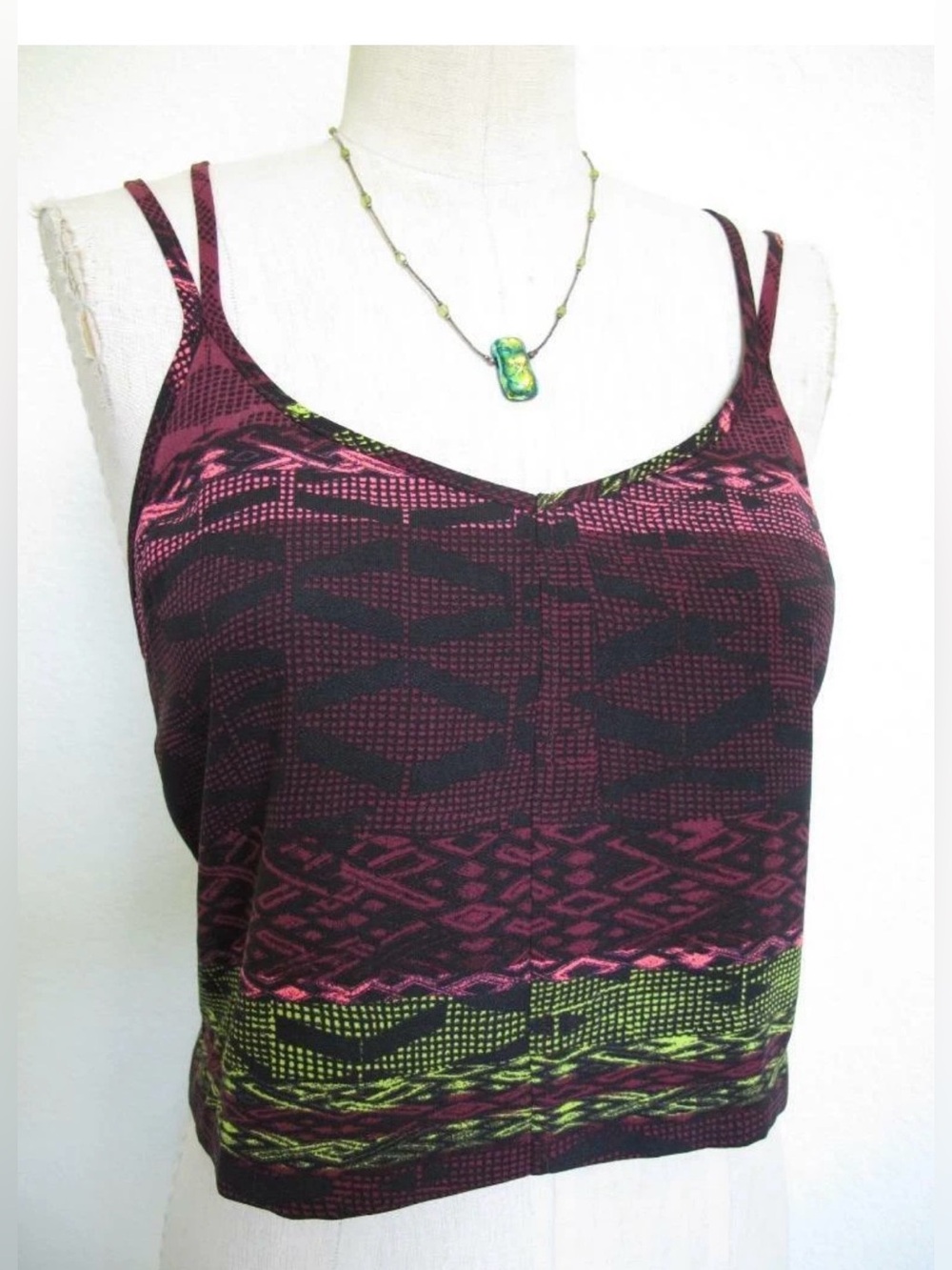 Silence + Noise crop tank w/ neon-accented geometric pattern and strappy back